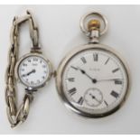A SILVER CASED ELGIN POCKET WATCH AND A SILVER VINTAGE TISSOT WATCH the Elgin with decorative