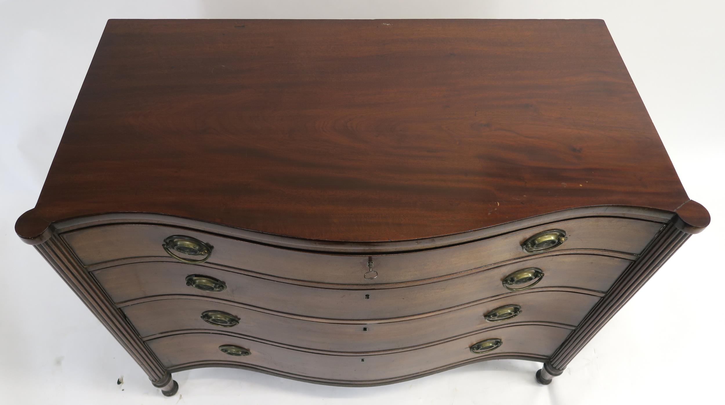 A 19TH CENTURY MAHOGANY SERPENTINE CHEST with four graduating drawers, flanked by fluted columns and - Image 3 of 19