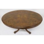 A VICTORIAN BURR WALNUT INLAID OVAL TILT TOP BREAKFAST TABLE