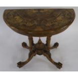 A VICTORIAN BURR WALNUT AND MARQUETRY INLAID DEMI LUNE FOLD OVER CARD TABLE on turned supports above