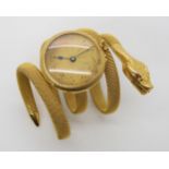 AN UNUSUAL 18K GOLD SNAKE BRACELET WATCH the sprung body of the snake holds a ladies watch stamped