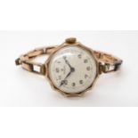 A 9CT GOLD LADIES VINTAGE ROLEX circa 1922, with pie crust bezel , a white scalloped fan pattern