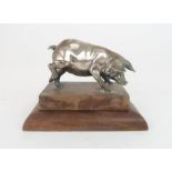 A WHITE-METAL MODEL OF A PIG on hardwood base and on oak base with plaque, inscribed "Oak From Orlop