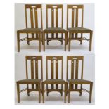 A 20TH CENTURY "MACKINTOSH CABINET MAKERS GLASGOW" OAK DINING TABLE AND SIX CHAIRS, table with heart