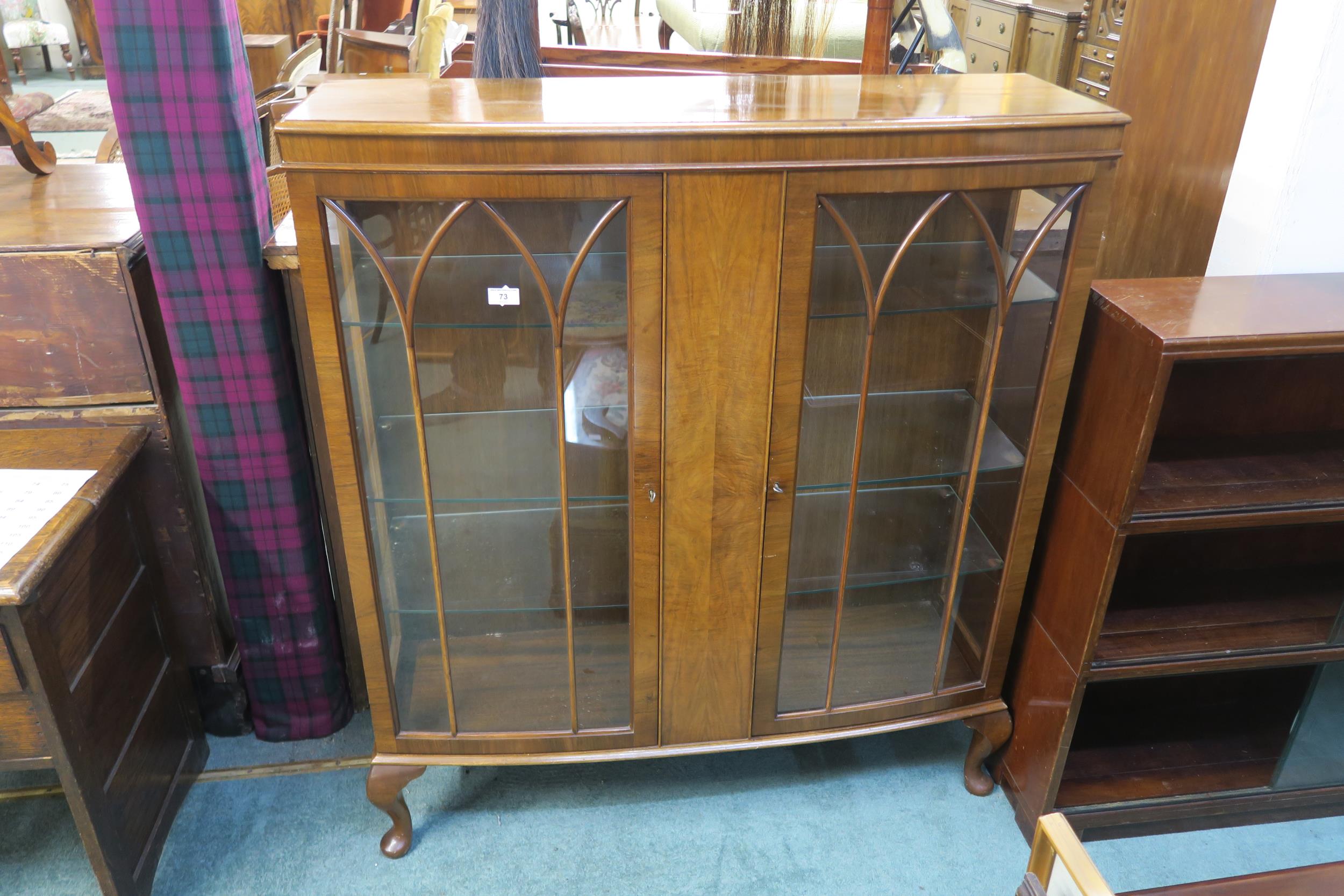 A 20th century mahogany glazed two door display cabinet Condition Report:Available upon request