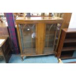 A 20th century mahogany glazed two door display cabinet Condition Report:Available upon request