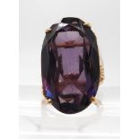 A 14k gold colour change faux amethyst ring, finger size O, weight 11.7gms Condition Report: