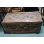 A 20th century oriental carved camphorwood blanket chest Condition Report:Available upon request
