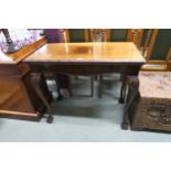 A Victorian mahogany foldover card table on shaped claw and ball supports Condition Report:Available