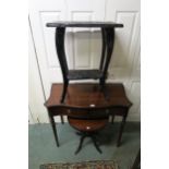 A 20th century mahogany serpentine front two drawer side table, carved Oriental style occasional