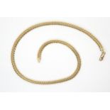 A 9ct gold flattened curb chain, length 42cm, weight 10.6gms Condition Report:Available upon