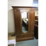 An Edwardian mahogany mirror doored wardrobe Condition Report:Available upon request