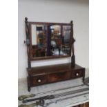 A Victorian mahogany three drawer toilet mirror Condition Report:Available upon request