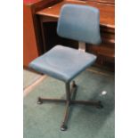 A mid 20th century revolving machinists chair Condition Report:Available upon request