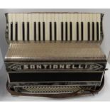 A 41 key 120 bass button Santianelli accordion, in faux mother of pearl with pierced nickel guard,