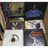 A substantial collection of Heavy Metal 45 rpm 7" vinyl records featuring Tygers of Pan Tang,