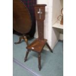 A 20th century mahogany spinning chair with carved back depicting a lighthouse below inscription "