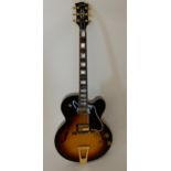 A Gibson ES-275 hollow body arch-top electric guitar serial number 12127713 2018 model in sunset