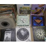 A lot of mostly punk and new wave 45 rpm 7" records with Honey Bane, Eddie and the Hotrods, The