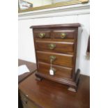 A Victorian mahogany two over three apprentice chest on bracket feet Condition Report:Available upon