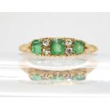 An 18ct gold emerald and diamond ring (af), size L1/2, weight 2.8gms Condition Report:Available upon