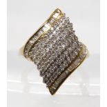 A 9ct gold QVC Jewellery Channel diamond cluster ring, set with estimated approx 0.80cts of