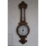 A Victorian oak aneroid barometer/thermometer Condition Report:Available upon request