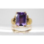 An 18ct gold amethyst set statement ring, size N, weight 7.7gms Condition Report:Available upon
