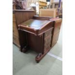 A 20th century mahogany Davenport with four drawers to right hand side Condition Report:Available