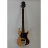 A Gibson 5 string bass 2013 model serial number 119030318 in natural wood finish and featuring a