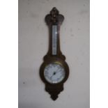 A Victorian oak aneroid barometer/thermometer Condition Report:Available upon request