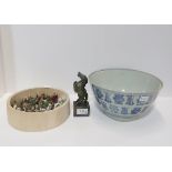 A Chinese green hardstone figure of a rearing horse, an antique blue and white bowl and a collection