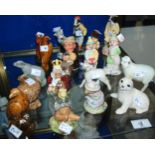 A collection of Beswick figures including Gryphon, King of Hearts, Hiker Badger, Shepherd