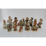 A collection of Hummel figures including Little Pharmacist, Postman etc Condition Report:all ok