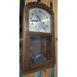 A 20th century oak cased wall clock Condition Report:Available upon request