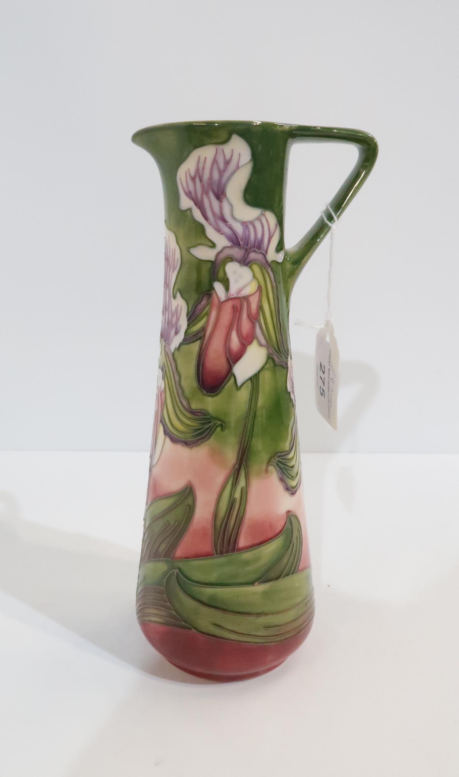 A Limited Edition Moorcroft jug designed by Phillip Gibson in Slipper Orchid pattern Condition