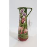 A Limited Edition Moorcroft jug designed by Phillip Gibson in Slipper Orchid pattern Condition