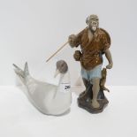 A Lladro gull and a Chinese figure of a man Condition Report:Available upon request