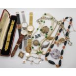 A retro gold plated ladies Tissot watch, further watches, a charm bracelet by Pilgrim and other