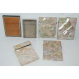 A white-metal filigree card case, four mother of pearl card cases (af) and another card case