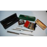 A paper mache pen case, white-metal propelling pencils and a collection of pens etc Condition