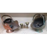 A copper coal scuttle, together with another brass example, a set of weighing scales and