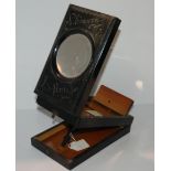 A stereoscope viewer, inscribed Souvenir de Paris, 22cm long Condition Report:Available upon