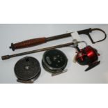 A collection of fishing items including two gaffs, Condex reel, Olympic reel etc Condition Report: