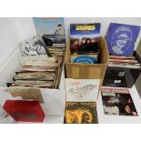 A collection of 45 RPM 7" vinyl records with Sex Pistols, Scheme, The Doors, The Rolling Stones, The