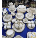 A Royal Doulton Clarendon pattern dinner service comprising tureens, coffee pot, plates, bowls, soup