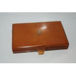 A Bakelite make-up case, travel manicure set, metal beauty box and mother of pearl opera glasses