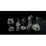 A collection of Swarovski crystal animals seahorses, fish, owls, squirrels, hedgehog etc (10)