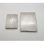 A George V silver cigarette case with engine turned decoration, inscribed to interior, by Cohen &