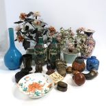 A collection of assorted oriental items including a animal head snuff mull, small metal boxes, white